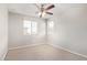 Bright bedroom featuring dual windows and ceiling fan at 5472 W Fulton St, Phoenix, AZ 85043