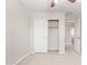 Bedroom featuring a closet and a door leading to hallway at 5472 W Fulton St, Phoenix, AZ 85043