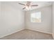 Bedroom with ceiling fan and a window for natural light at 5472 W Fulton St, Phoenix, AZ 85043