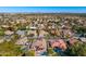 Aerial shot of a neighborhood with beautiful homes, mature landscaping, and inviting outdoor spaces at 5670 W Linda Ln, Chandler, AZ 85226