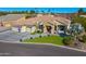Aerial view of a beautifully landscaped home featuring a three-car garage and well-manicured front yard at 5670 W Linda Ln, Chandler, AZ 85226