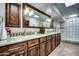 Bathroom featuring a double vanity with plenty of cabinet storage and stylish design at 5801 N 25Th Pl, Phoenix, AZ 85016