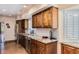 Updated kitchen with stainless steel appliances, granite countertops, and custom cabinetry at 5801 N 25Th Pl, Phoenix, AZ 85016
