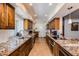 Spacious kitchen with stainless steel appliances, granite counters, and ample cabinet space at 5801 N 25Th Pl, Phoenix, AZ 85016