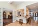 The kitchen features a granite breakfast bar that leads into a living room and dining room; perfect for entertaining at 5801 N 25Th Pl, Phoenix, AZ 85016