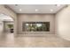 Bright and airy living room with a large window and views of the desert landscape at 6181 E Brilliant Sky Dr, Scottsdale, AZ 85266