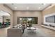 Modern living room with large view window and stylish furniture at 6181 E Brilliant Sky Dr, Scottsdale, AZ 85266