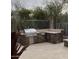 Well-equipped outdoor kitchen featuring stone accents, a stainless steel grill, and ample counter space for entertaining at 6181 E Brilliant Sky Dr, Scottsdale, AZ 85266