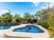 Backyard pool and hot tub oasis with mature landscaping providing privacy and a serene desert backdrop at 6181 E Brilliant Sky Dr, Scottsdale, AZ 85266