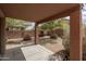 Covered patio with a built in BBQ and firepit perfect for outdoor relaxing and entertaining at 8339 W Molly Ln, Peoria, AZ 85383