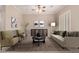 Bright living room with a neutral color scheme, stylish furniture, and elegant decor at 8367 W Lariat Ln, Peoria, AZ 85383