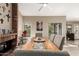 This is a spacious dining room with views of the outside from a large bay window at 8861 E Sutton Dr, Scottsdale, AZ 85260