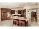 This open kitchen is adjacent to the dining area and features wood look tile at 8861 E Sutton Dr, Scottsdale, AZ 85260