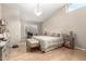 Bright main bedroom features hardwood floors, plantation shutters, and ample natural light at 8861 E Sutton Dr, Scottsdale, AZ 85260