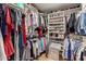 Spacious walk-in closet providing ample storage for clothes, shoes, and accessories at 8861 E Sutton Dr, Scottsdale, AZ 85260