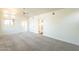 Large bedroom featuring new carpet and multiple entrances at 9834 N 1St St, Phoenix, AZ 85020