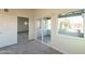 Bright bedroom with new carpet, slider to balcony and connecting room at 9834 N 1St St, Phoenix, AZ 85020