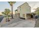 A modern two-story home with desert landscaping and a covered carport offering a clean, contemporary design at 9834 N 1St St, Phoenix, AZ 85020