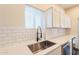This modern kitchen features stainless steel appliances, quartz countertops and white subway tile at 9834 N 1St St, Phoenix, AZ 85020