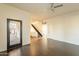 Open-concept living room with tile floors, a ceiling fan, and seamless flow into other areas of the home at 9834 N 1St St, Phoenix, AZ 85020