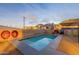 Backyard pool with artistic murals creates a fun outdoor oasis at 9834 N 1St St, Phoenix, AZ 85020