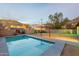 Enjoy a refreshing swim in your own pool, set against privacy walls with creative outdoor art at 9834 N 1St St, Phoenix, AZ 85020
