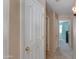 Hallway with closed doors and carpet flooring at 995 E Vernoa St, San Tan Valley, AZ 85140