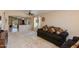 Spacious living room with neutral carpeting and great natural light at 995 E Vernoa St, San Tan Valley, AZ 85140