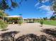 Well-maintained community playground featuring a shaded play area and picnic tables at 995 E Vernoa St, San Tan Valley, AZ 85140