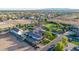 Expansive property with a well-manicured lawn, pool, and detached garage in a quiet neighborhood at 10059 W Villa Lindo Dr, Peoria, AZ 85383