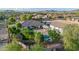 Aerial view showcasing a backyard oasis with a pool and lush landscaping at 10059 W Villa Lindo Dr, Peoria, AZ 85383