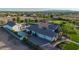 Overhead shot showcasing an estate with multiple garages and a large landscaped yard at 10059 W Villa Lindo Dr, Peoria, AZ 85383