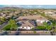 Elevated view of a home featuring desert landscaping and stunning mountain views at 10059 W Villa Lindo Dr, Peoria, AZ 85383