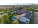 Beautiful property with a sparkling pool and spa surrounded by mature trees and desert landscaping at 10059 W Villa Lindo Dr, Peoria, AZ 85383