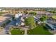 Expansive aerial view of a luxurious home with manicured lawns, a fountain, and desert landscaping at 10059 W Villa Lindo Dr, Peoria, AZ 85383