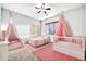 Charming bedroom with teepee, pink accents, and soft textures creates a playful and inviting space at 10059 W Villa Lindo Dr, Peoria, AZ 85383