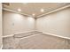 Carpeted bonus room with a raised platform, neutral walls, and recessed lighting at 10059 W Villa Lindo Dr, Peoria, AZ 85383