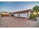 Property featuring a brick driveway, mature landscaping, and multi-car garage at 10059 W Villa Lindo Dr, Peoria, AZ 85383