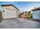 Spacious three-car garage and outdoor kitchen perfect for entertaining at 10059 W Villa Lindo Dr, Peoria, AZ 85383