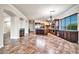 Open concept kitchen with an island, wood cabinets, and stainless steel appliances at 10059 W Villa Lindo Dr, Peoria, AZ 85383