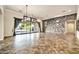 Spacious living room features tile flooring and access to a covered outdoor living area at 10059 W Villa Lindo Dr, Peoria, AZ 85383