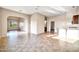 Spacious living room with tile flooring, arched entryways and natural light at 10059 W Villa Lindo Dr, Peoria, AZ 85383