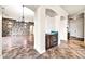 Open living space featuring a bar area and tile flooring, enhancing the home's flow at 10059 W Villa Lindo Dr, Peoria, AZ 85383