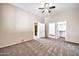 Large main bedroom suite with neutral carpet, ensuite bathroom and walk-in closet at 10059 W Villa Lindo Dr, Peoria, AZ 85383