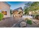 Beautiful outdoor kitchen with stone pillars and spacious backyard at 10059 W Villa Lindo Dr, Peoria, AZ 85383