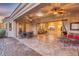 Stunning covered patio leading to a spacious living room with natural light at 10059 W Villa Lindo Dr, Peoria, AZ 85383