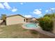 An idyllic pool and beautiful, well-maintained backyard at 10817 W Wilshire Dr, Avondale, AZ 85392