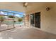 Covered patio overlooking the pool, with sliding door access to the interior at 10817 W Wilshire Dr, Avondale, AZ 85392