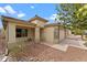 Charming single-story home featuring a well-maintained front yard and a two car garage at 10817 W Wilshire Dr, Avondale, AZ 85392