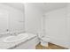 Bathroom featuring granite countertops, a shower-tub combo, and modern fixtures at 148 E Douglas Ave, Coolidge, AZ 85128